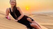 Sunset Desert safari with Camel Ride Sand Board & BBQ Dinner 