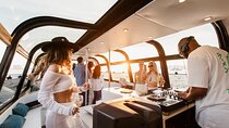 DJ party on a luxurious boat, with open bar and snacks, at sunset
