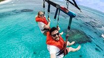Parasailing above Turquoise Ocean Waters in Montego Bay 