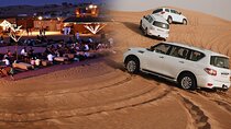Evening Desert Safari with Quad bike Camel Riding BBQ Dinner