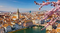 Private transfer from Gstaad to Zurich, 2h Stop in Bern