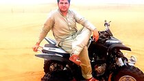 60 Min Quad Biking Tour In Dubai With Camel Ride & Sand Boarding 