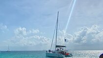 Isla Mujeres on luxury catamaran with snorkel, open bar and lunch