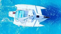 Premium Isla Mujeres Tour by Private Catamaran