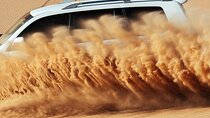 Abu Dhabi Dune Bashing, Sand Surfing, Camel Ride, and BBQ Dinner