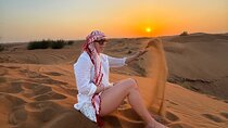 Premium Desert Safari with Pickup,Quad Bike,Camel Ride & Dinner