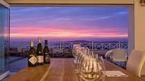 Roundtrip transfer to Santo Winery from your hotel