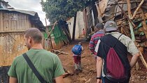 Visit the largest slum in Africa with a Local