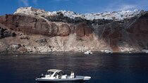 Island hopping (Santorini & Ios)on a private motorboat 