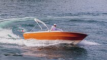 Wooden boat ride on Lake Como