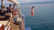 Zadar: Shared Authentic Wooden Boat tour with unlimited champagne