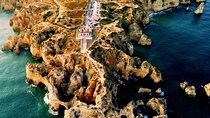 Walk at sunset in the caves DA Ponta DA Piedade 1H30M