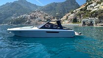 Positano , Praiano to Capri private boat tour 