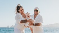 Family photo shoot on beach monuments