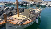 Sail on an electric Majorcan llaut from Puerto Portals
