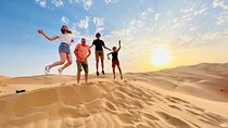 Abu Dhabi Evening Desert Safari with BBQ Dinner and Shows