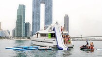 Dubai Ride & Slide Yacht Cruise with BBQ, Snorkeling & Pool