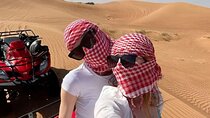 Dubai Desert Safari Dune Bashing Camel Ride Sandboarding and BBQ