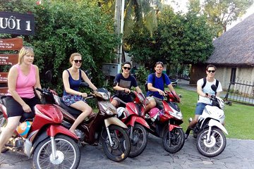 Small group Saigon Inside Out by Motorbike for 3 Hours