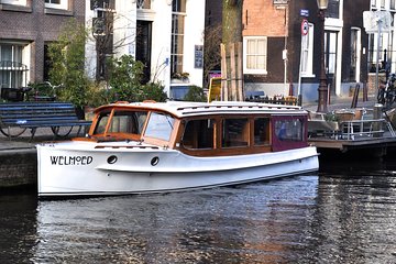 Private Guided Historic Amsterdam Canal Cruise in a Salon Boat