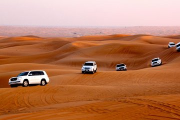 Dubai Desert Safari with Dune Bashing, Camel Ride, & BBQ Dinner