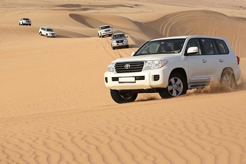 Best Dubai Desert Safari with Buffet Dinner,Sand Boarding & Shows