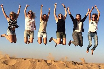 Dubai Desert Safari with Quads, BBQ Dinner, Camel ride, & Shows 
