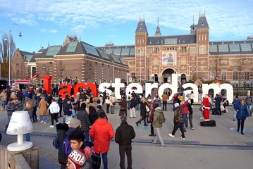 Amsterdam in a Nutshell 4 Hour Private Car Tour and Amsterdam Born Private Guide