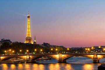 Paris By Night with Seine River Cruise and Roundtrip Luxury Transportation