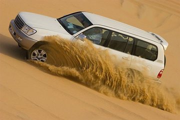 Desert Safari Dubai with Camel Riding, Sandboarding, Live Shows