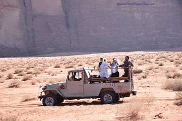 Full day Jeep tour in Wadi Rum with Bedouin guide. Including lunch, water & tea