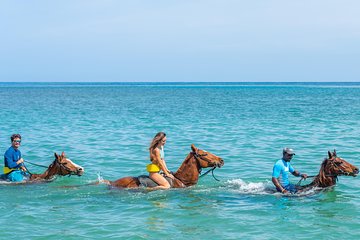 Dunn's River Falls Climb plus Ziplines, ATV, Horse Ride & Swim from Montego Bay