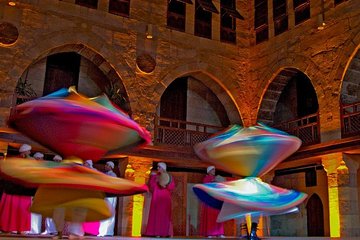 Cairo by night including Tanoura Show at Wikalet Al Ghouri Khan El Khalili Tahrir Square