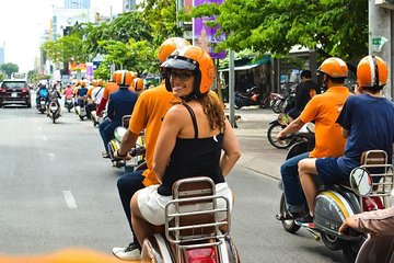 Food tour by Vespa - SAIGON AFTER DARK 