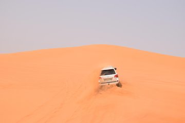 Private Morning Desert Safari with Camel Riding & Sand Boarding