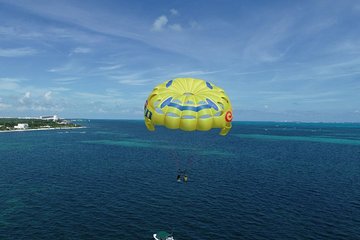 Fly Above Cancun Bay: Parasailing Experience