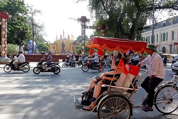 Cyclo Tour - Water Puppet Show and " Foot on Food tour "(Duration 4 hours)