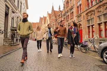 Bruges Audio Guided or Guided Day Trip with Canal Cruise Option from Paris