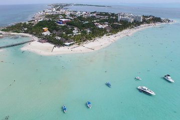 Catamaran adventure to Isla Mujeres with Snorkel,Buffet,Open Bar and Beach Club