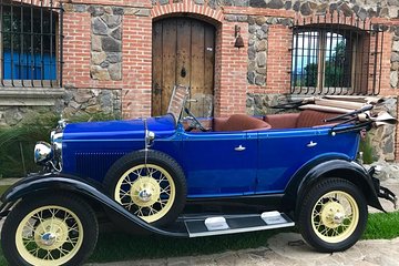 Antigua in a classic car