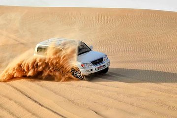 The Best Dubai Desert Safari with Quad Biking & Dune Bashing & BBQ & Live Show