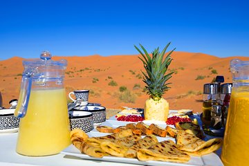 Merzouga: Overnight in Royal Desert Camp with Camel Ride, meals & sandboarding