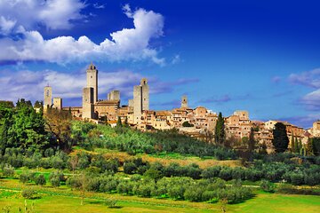 Volterra and San Gimignano with Bocelli's Theatre Private Tour from Lucca