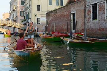 Learn to row in the canals of Venice