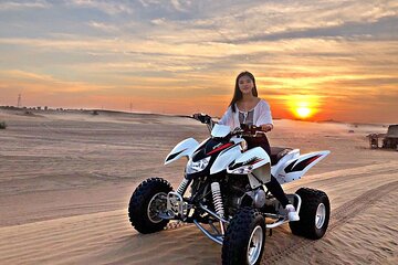 1-Hour Quad Bike Adventure: BBQ Dinner, Sandboarding & Shows!