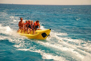 Dolphin tour & banana boat fun with snorkeling from Hurghada