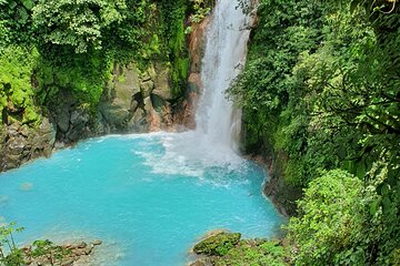 Rio celeste waterfalls, volcano and sloths