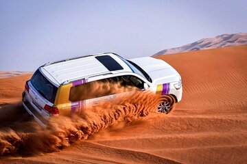 Desert Safari W/BBQ Dinner, Quad Bike, Camel Ride, & Sandboarding
