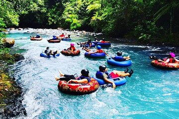 3 in 1, zipline over blue river, tubing on blue river and sloths