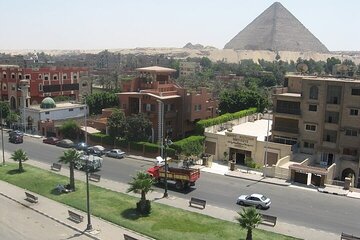 Cairo Layover Tour from Cairo Airport to Giza Pyramids Eg- Museum and Eg-Bazaar